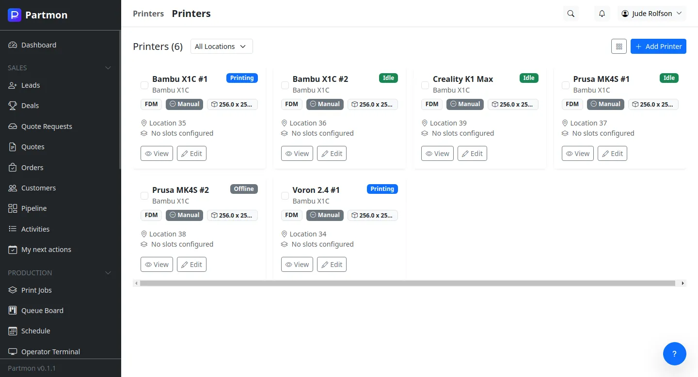 Printer fleet grid showing real-time status
